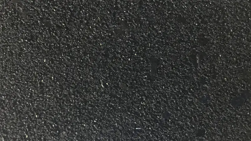 Gemstone stucco finish — close-up of the texture on a sample board