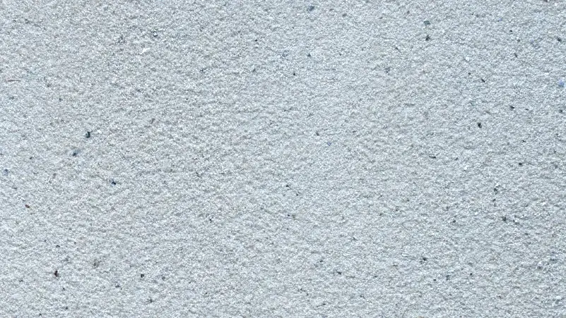 Glitterock stucco finish — close-up of the texture on a sample board