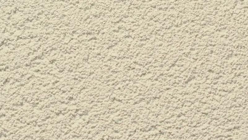 Marble Coat stucco finish — close-up of the texture on a sample board