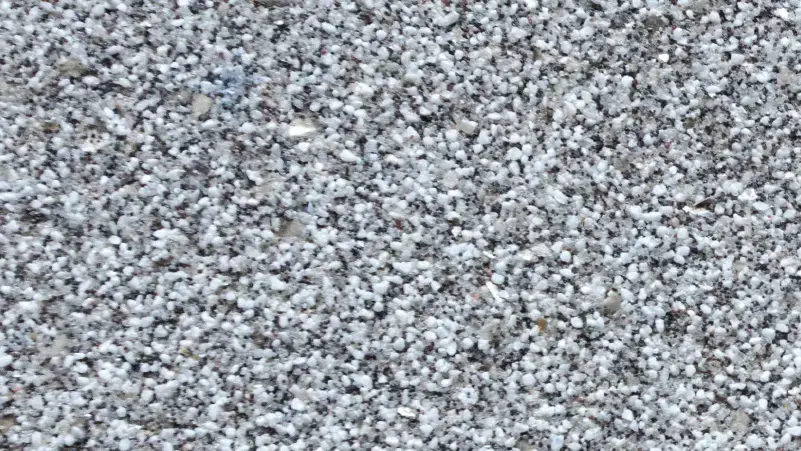 Moonstone stucco finish — close-up of the texture on a sample board