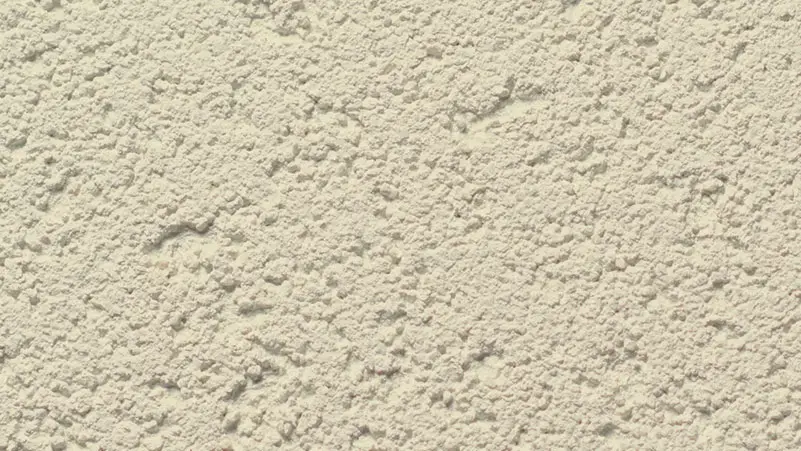 Pebble Rock stucco finish — close-up of the texture on a sample board
