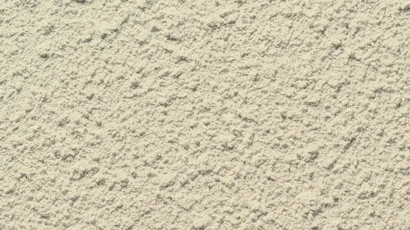 Spray stucco finish — close-up of the texture on a sample board
